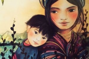 어린 아들이 엄마에게 기대고 있다